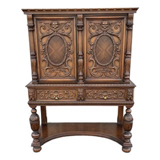 1910s Revell & Co Jacobean Carved Walnut Dining Cabinet For Sale