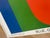 This striking exhibition poster features Ellsworth Kelly’s iconic work Blue, Green, Red I (1964-65), exemplifying his...