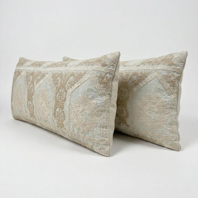 This beautiful 16'' x 39'' hand-embroidered Suzani pillow cover set was made from authentic Uzbek cotton fabric. The...