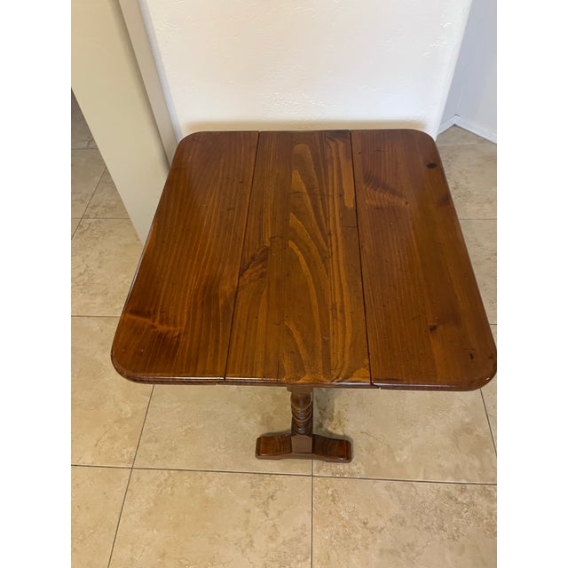 Made by Ethan Allen. Company’s name and logo stamped underneath. Could be used as a small dining table, card table,...