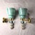 Pair of mid-century modern Murano glass wall sconces, Italy circa 1990s. The pair of Italian sconces is made of acqua...