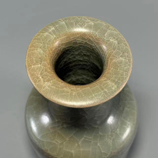 Antique Chinese Longquan celadon vase with beautiful natural crackle glaze. Elegant straight body and flared rim, classic...