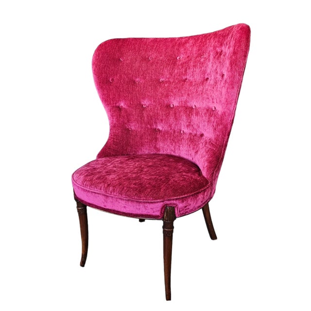 This vintage wing back chair from the early 20th century exudes timeless elegance. The chair is upholstered in a sumptuous...