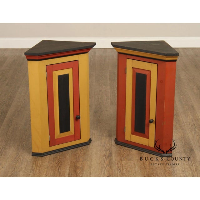 High Quality American Made Set of Two Handcrafted Folk Art Corner Cabinets Featuring Bold Color Blocking In Red, Yellow,...