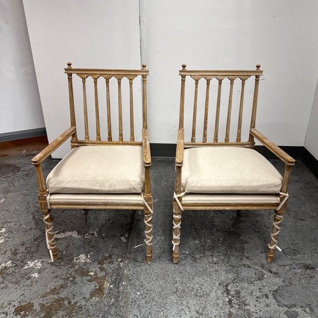Design Plus Gallery presents a Pair of the Barnaby French Country Pine Wood Armchairs from the Matthew Izzo Collection....