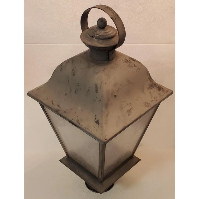 Rustic metal electric lantern with smoked ice glass panels. This lantern has great wear from age an use.