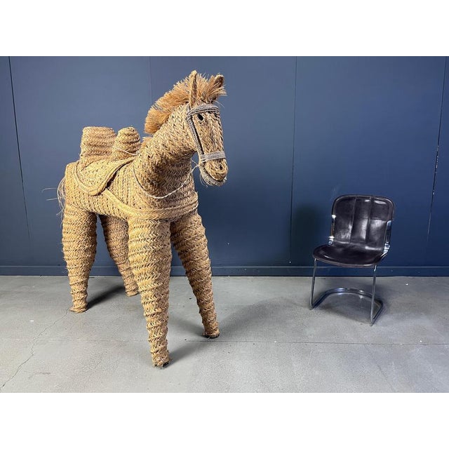 Entirely hand braided hand made straw horse, which is life size. This very attractive and decorative item is a real eye...