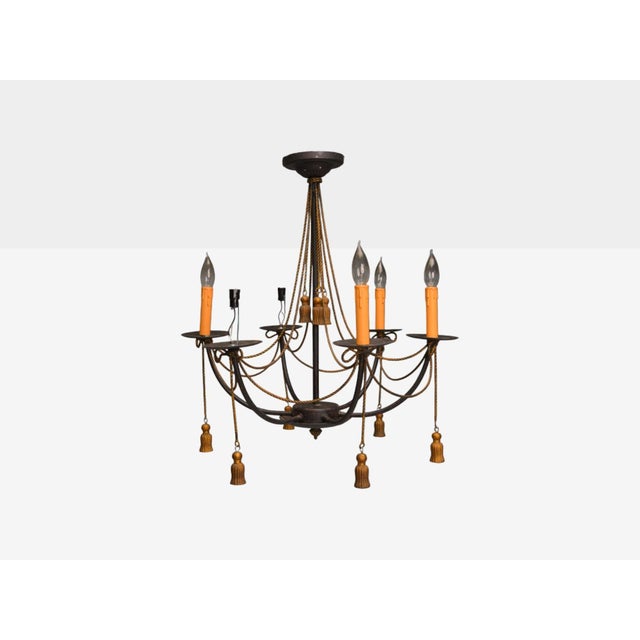 Hollywood Regency Style, Metal, Brass, Tassel Motif Chandelier, USA, 1960s A painted metal and brass 6 light chandelier...