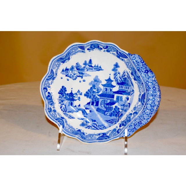 Early 19th century signed Spode handled serving dish with a wonderful shaped handle and scalloped edge. The pattern is of...