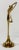 Vintage brass ballerina or dancer figure in arched pose on brass pedestal stand. Lovely patina.