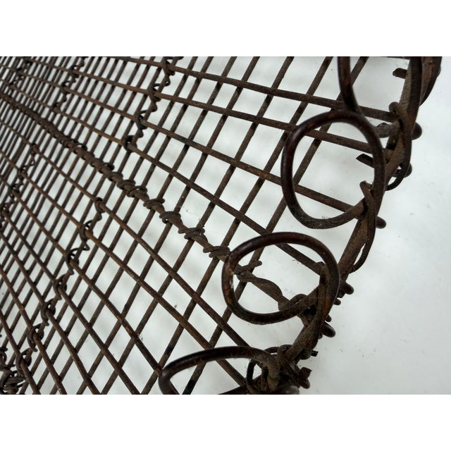 Charming French antique woven wire tray or cake cooling rack. Wonderful details, round feet, twisted loop border, and...