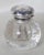 Pairpoint ball shaped inkwell with the controlled bubble pattern that became synonymous with the company. The glass was...