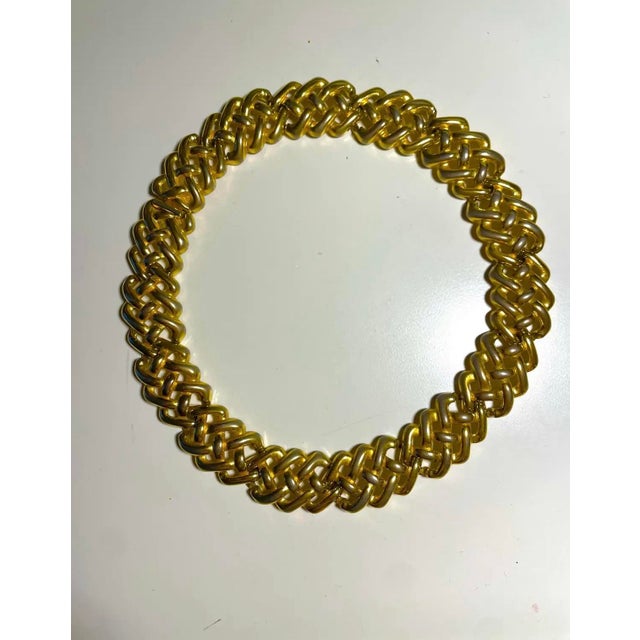 A bold expression of 1980s Parisian glamour, this vintage Givenchy necklace features a substantial, sculptural silhouette...