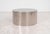 Custom Polished Metal Drum Coffee Table in the Style of Brueton, 1980 Polished metal, adjustable glides Custom-made drum-...