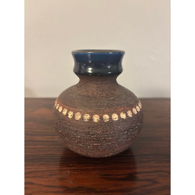 Beautiful vase or weed pot made by Gabriel in Sweden. Made in the 1950s. A stunning mix of deep textured brown with a rich...