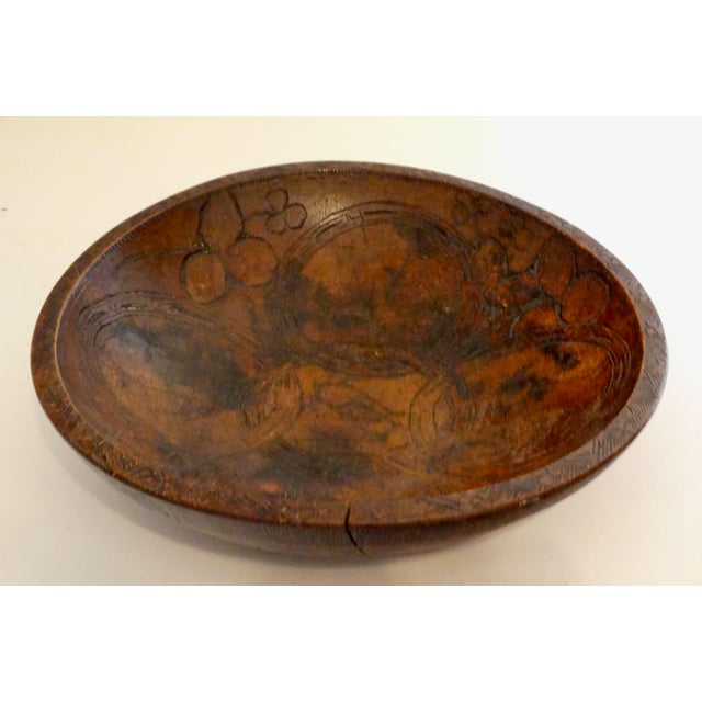 American handcrafted decorative bowl with carved rabbits. It is beautifully hand carved with rabbits and a geometric...