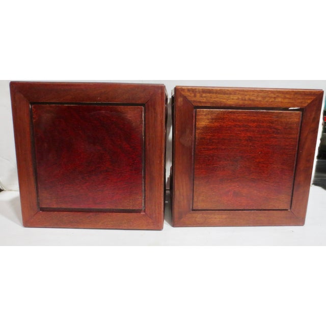 Chinese hardwood rosewood, or like large square stands with Longevity symbols on each side. Square stand measuring 9" on...