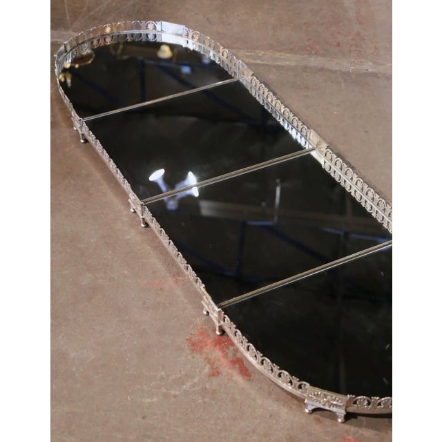 Decorate a dining table with this monumental four-section antique "Surtout de Table". Crafted in France circa 1830 and...