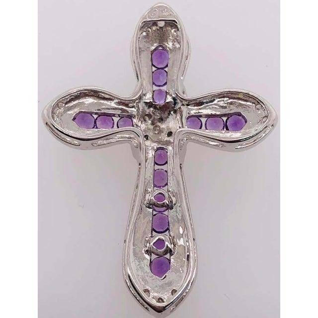 14Kt White Gold Pendant with Amethysts and Diamonds 3.76 grams Total weight. 25 by 33 MM