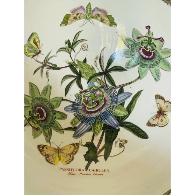 Beautiful glazed ceramic botanical bowl with passionflower and butterflies. Made in England.