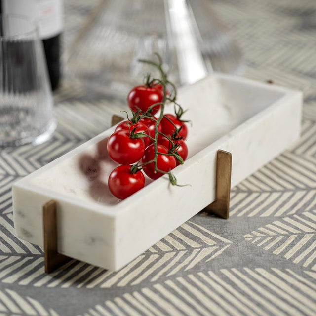 This tray has a rich and classy look and works for various purposes. Crafted from marble, this rectangular tray sits atop...