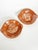 Charming pair of French glazed pottery dishes featuring a warm terracotta-colored ground decorated with contrasting white...