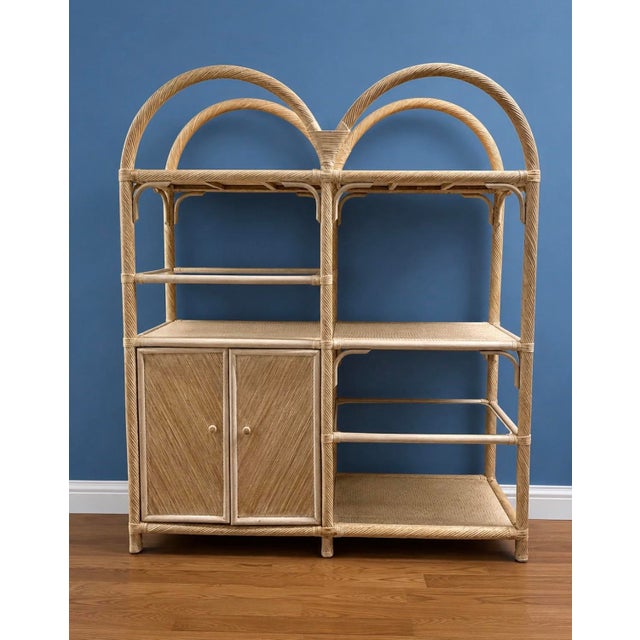 Very nice large vintage whitewashed twisted pencil reed Etagere'. Great display for a collection or just all of your...