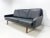 1960’s Danish Leather Sofa. Sculptural vintage black leather 3 seat sofa on teak legs.
