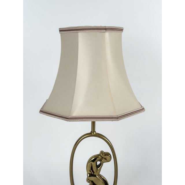 Swedish Modern Table Lamp, 1940s A refined Swedish Modern table lamp from the 1940s, distinguished by its sculptural...