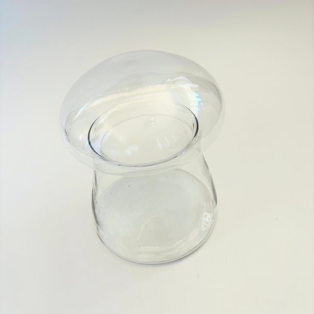 A wonderful vintage glass jar in the shape of mushroom. Versatile large size for storing a variety of items. Measures...