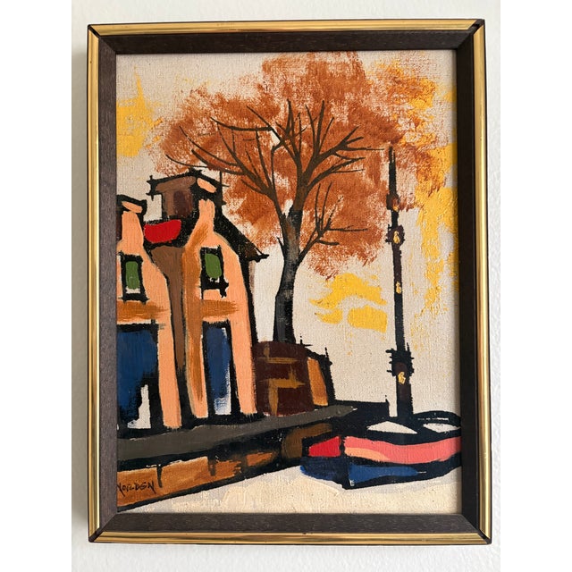 A signed mid-century European urban or canal-side landscape with stylized buildings, dark linear outlines and a prominent...