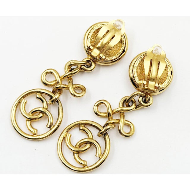 Chanel Chanel Vintage Gold Plated Round CC Twisted Cross Long Clip on Earrings, A Pair For Sale - Image 4 of 5
