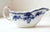 Elevate your tablescape or display cabinet with this exceptional English Gravy Boat dating back to 1890-1910. This antique...