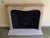 Louis XV carved limestone mantel with a replacement hearth. This mantel was imported from Europe and installed in the...