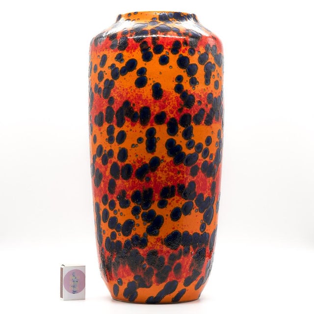A striking floor vase by Scheurich Keramik, produced in West Germany during the 1970s. The iconic model 517-45 combines a...