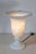This 20th-century French alabaster lamp exemplifies timeless elegance with its classic design and luxurious material....