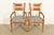 An exceptional pair of Mission or Arts & Crafts style armchairs or dining captain chairs By Stickley USA, Circa Late 20th...