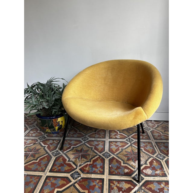 A true design classic: the walter knoll model 369 armchair. this sculptural armchair from the 1950s makes a statement with...