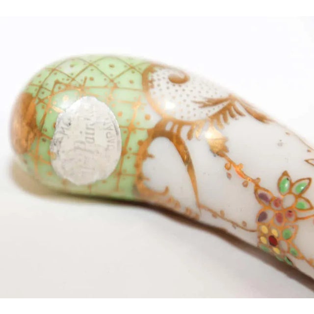 Vintage Sheffield carving knife and fork set, stainless steel, pink Floraine porcelain handles. This vintage set of fine...