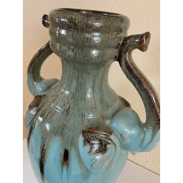 A very interesting and attractive vase/vessel. The handles are looking good. PLEASE always remember...NEVER pick up a...