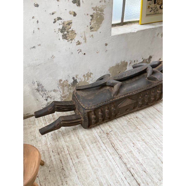 Old very heavy berber wooden chest, from the 70s. this chest is entirely sculpted and cut by hand, it has a very dark...