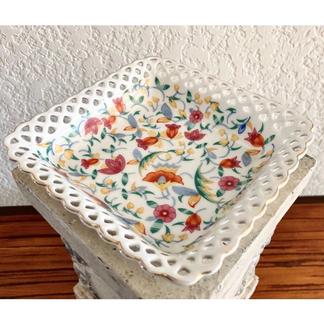 Excellent Pre-Owned Condition. Pristine. Beguiling floral chintz reticulated gilt edge porcelain catchall dish or petite...