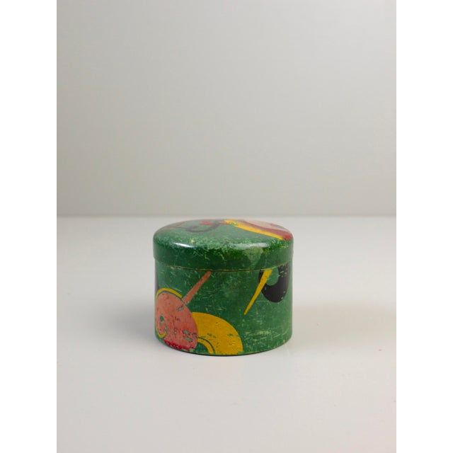 A stylish all original lidded container. The hand painted design is reminiscent of the paintings of Kandinsky.