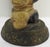 This hand-carved soapstone figure of a bearded man holding a fish in one hand and a staff in the other will make you...