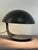 Direct-light table lamp composed of two molded resin bodies. The lower body rotates on the underlying steel base and is...