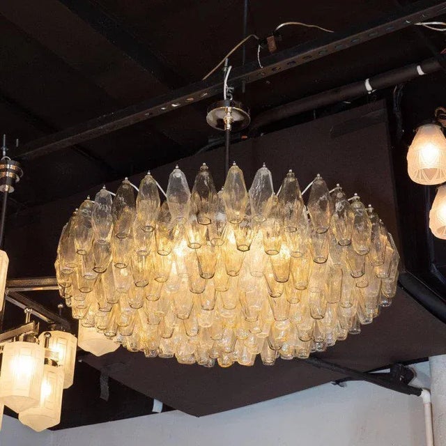 This stunning chandelier was realized by hand in Murano, Italy- the islands off the coast of Venice renowned for centuries...