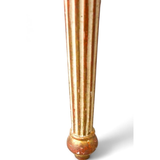 Elegant louis xvi style coffee table dating from the 1950s. It is made up of a white marble top. The base is in gold and...