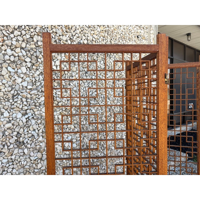Mid-Century Teak Four Panel Room Divider Screen. Offered is a versatile four panel screen or room divider with a geometric...