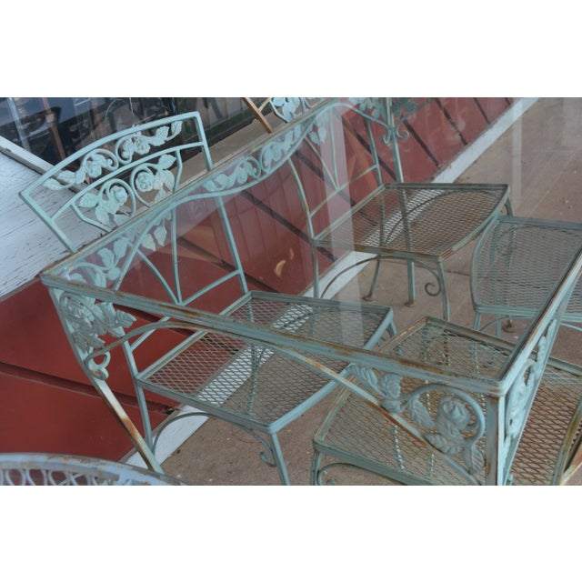 This is a great looking set, possibly Salterini, no makers marks. Tempered glass top, wrought iron frame, quite heavy,...