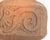 A studio pottery tile made by the American artist Mark Bulwinkle (born 1946). This tile depicts an impressed image of...